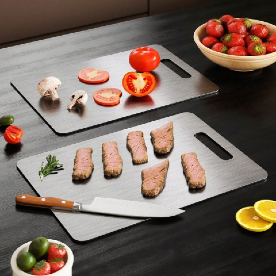 laser-cut titanium cutting board edge showing clean, sharp, industrial-style contours and brushed metal finish
